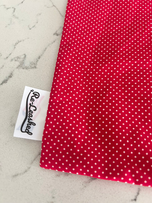 Close up red polka dot bandana on white background