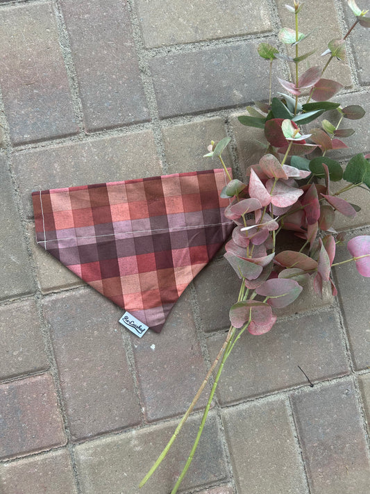 Fall plaid bandana on brick, with faux branch